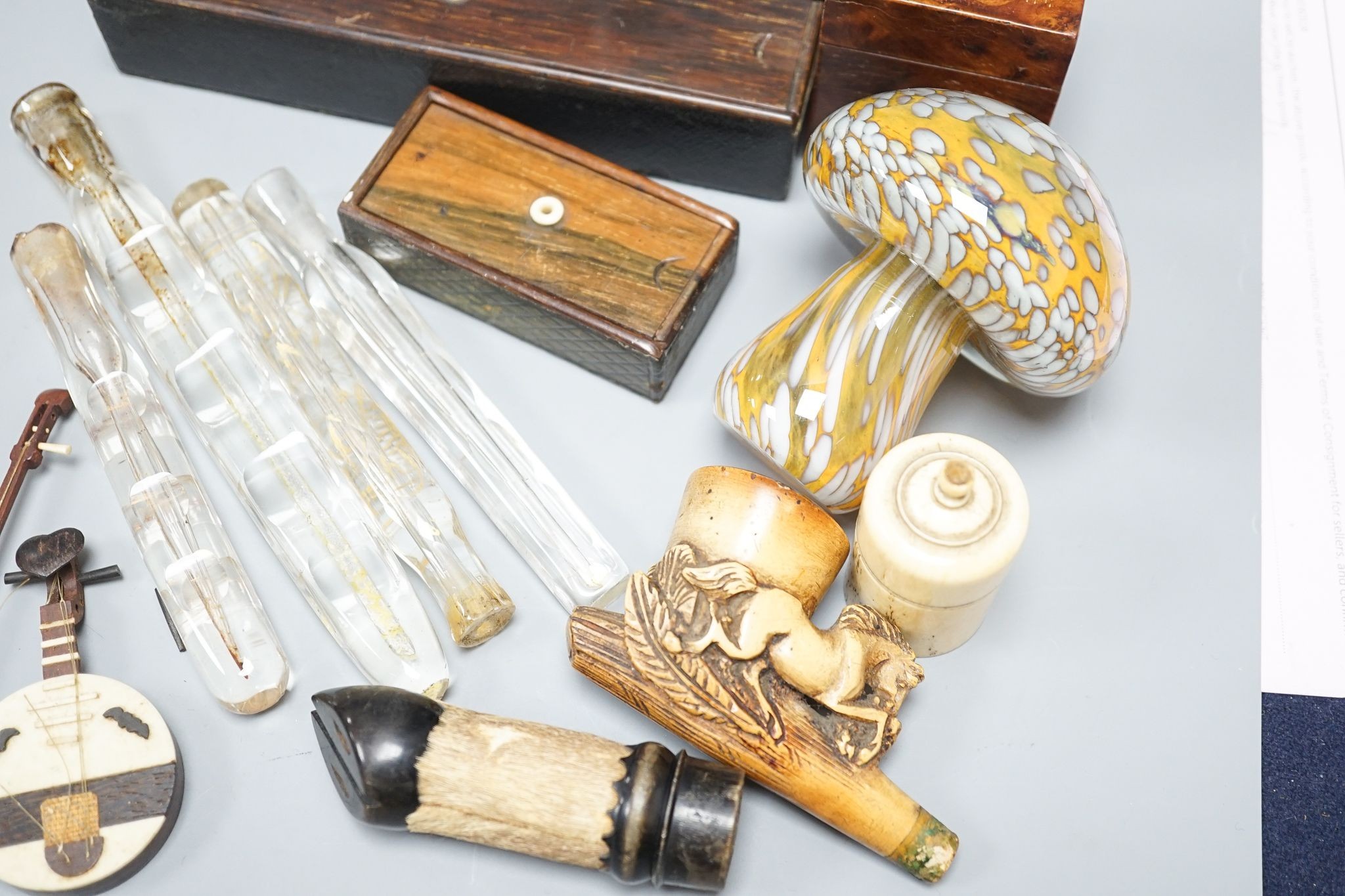 Four Victorian treen match holders with ‘go to bed’ tops a meerschaum pipe, four glass scent vials, a bone match holder Mdina toadstool, glass scent bottles etc.